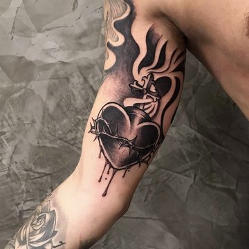 Tatuaże Męskie na Bicepsie