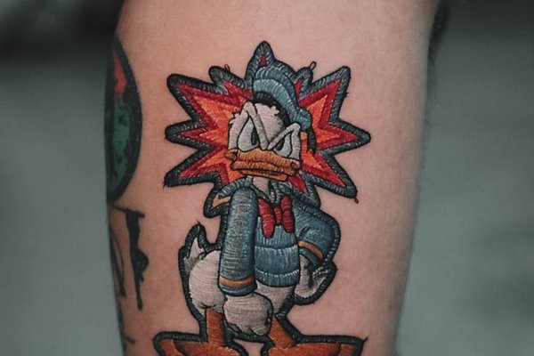 tatuaż Kaczor Donald znaczenie wzór