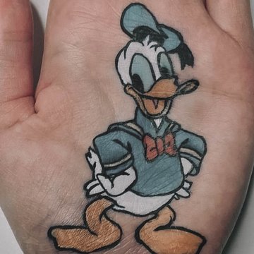 tatuaż Kaczor Donald znaczenie wzór