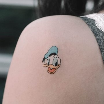 tatuaż Kaczor Donald znaczenie wzór
