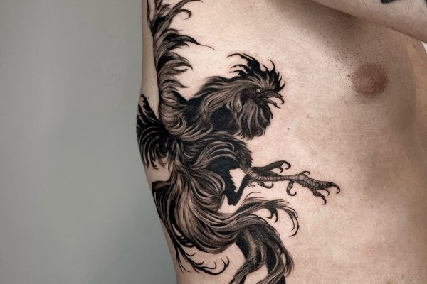 Tatuaż tygrys na żebrach męski symbol odwagi