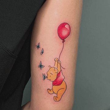tatuaż Kubuś Puchatek znaczenie wzór